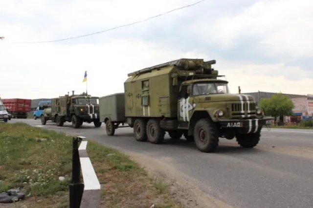 Бійці 5 батальйону повертаються до Франківська на автобусах без вікон і дверей (Фоторепортаж) — фото 4